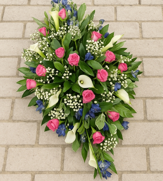 Pink white and blue casket spray