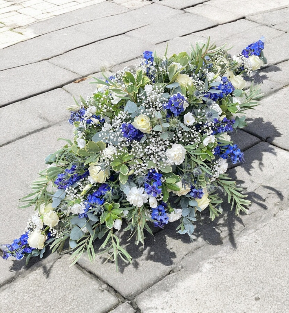 Blue and white Casket Spray