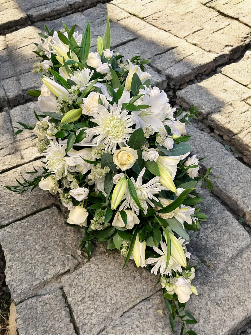 White Casket Spray with lilies