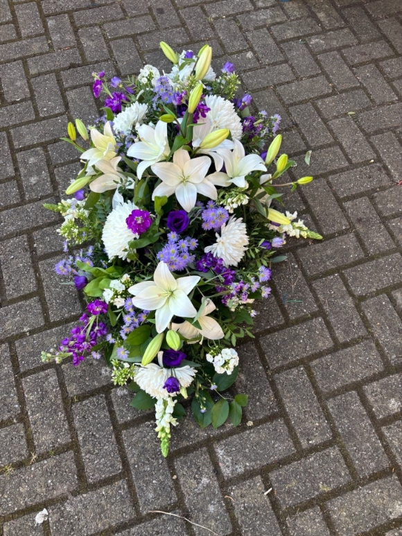 Eco Friendly Purple and Lilies Casket Spray